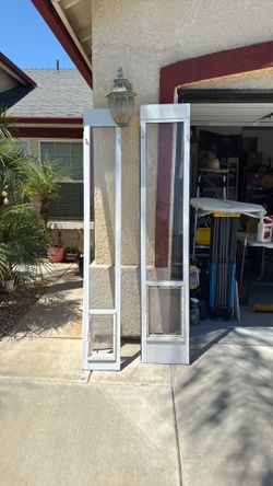 Two dog doors. XL and S for sliding doors. $50 EACH