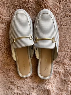 Women’s beige and white mules