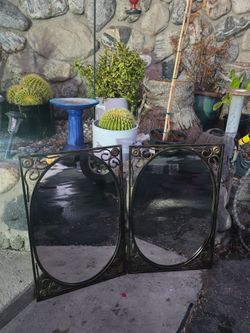 Pair of Ornate Black Metal Framed Mirrors