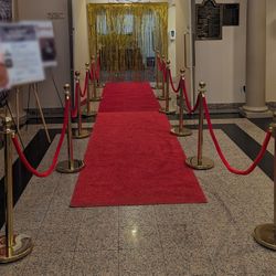 12 stanchions with red ropes - events company downsizing