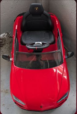 Brand new Ferrari kids electric riding car.