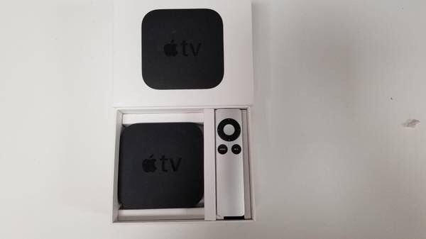 APPLE TV with accessories