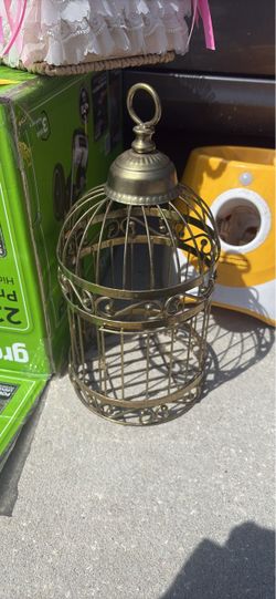 golden fake bird cage