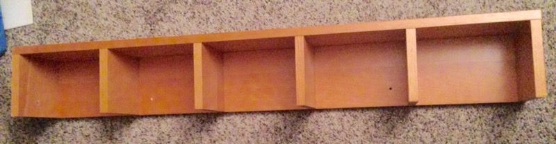 Wooden shelf/organizer you can have it set up right or mount to the wall anyway you would like