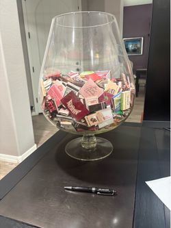 Large glass with match collection