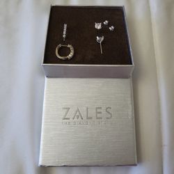 Zales two  sets Of diamond earrings Zales never been  warn