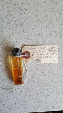 Antique cast iron perfume bottle