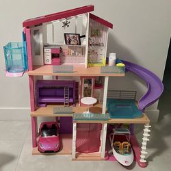 Barbie dream house with extras