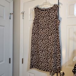 Sleeveless Brown Dress With White Circular Patterns