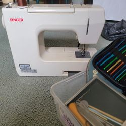 Singer Sewing Machine and Box Of Supplies 