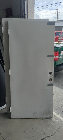 Exterior metal single door smooth finish Warehouse style approximately 35.75x79