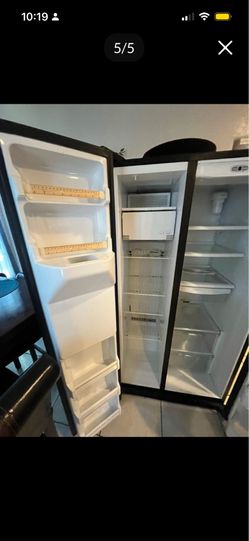 Refrigerator  $200 GE Side by Side
