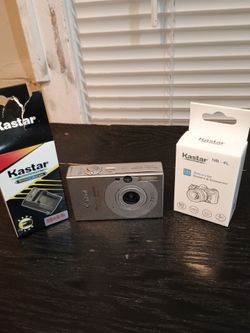 Canon PowerShot SD1000 With 2 Batteries 1 Brand New And Brand New Charger