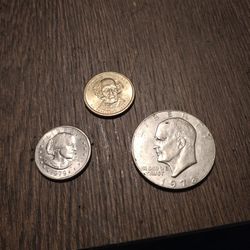 Older Half Dollar And Two 1 Dollar Pieces