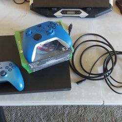 Xbox One X +games + 2 Wireless Controllers