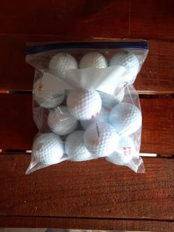 14 Used Titleist Golf Balls 