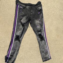 purple and black distressed jeans 