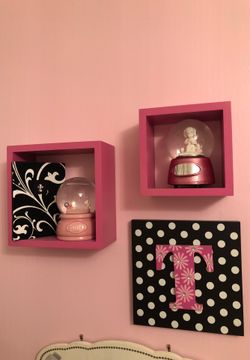 Pink shelves and “T” frame.
