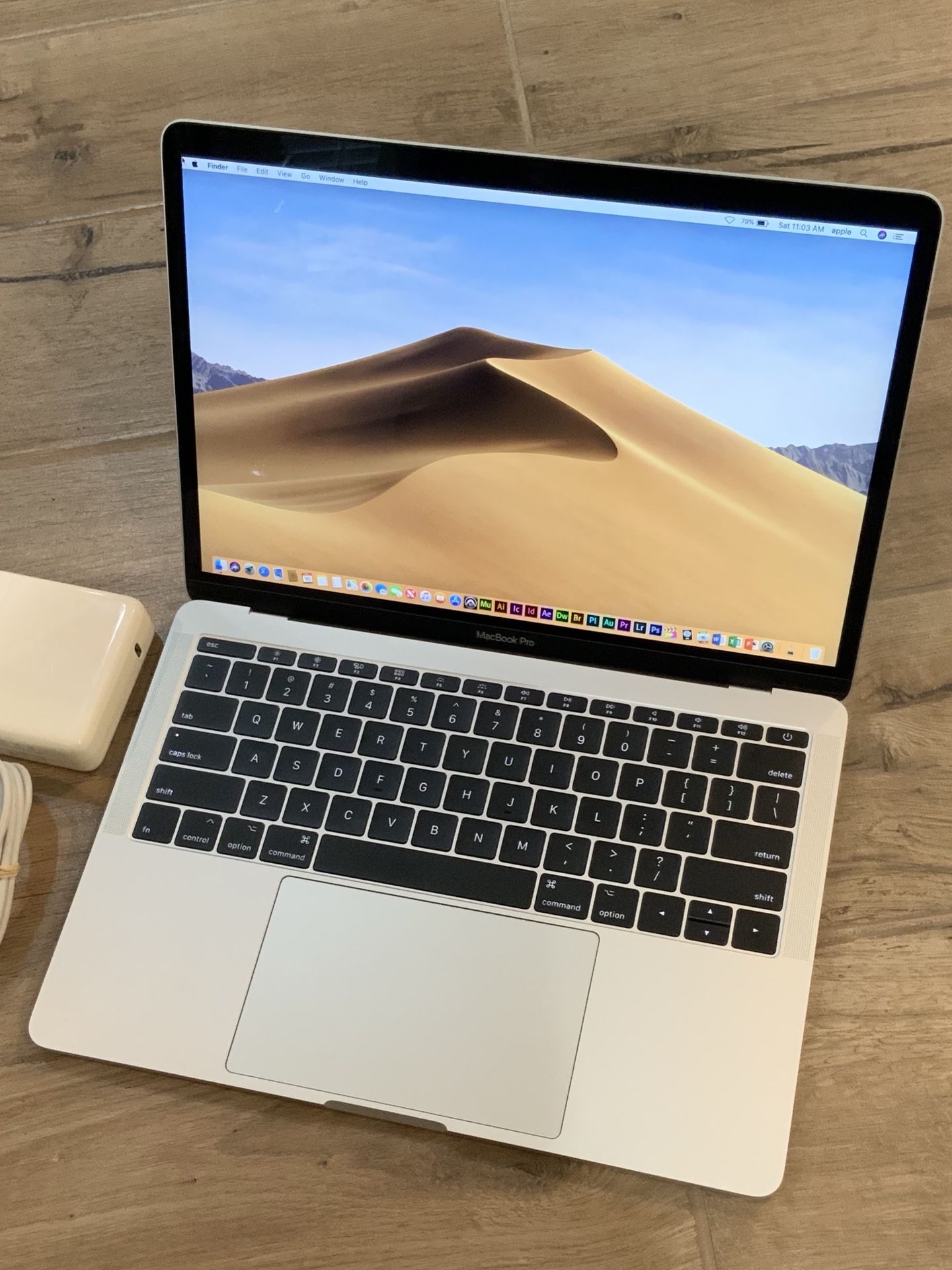 2017 MacBook Pro 13 inch Retina 256GB with Apple Care Plus September 2020 and $700 in paid software