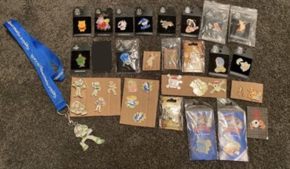 Disney Trading Pins (set of 33) Plus Buzz Lightyear lanyard