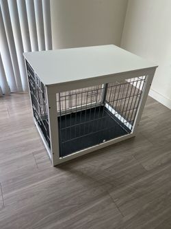 White dog cage