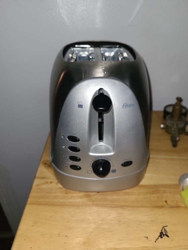 New Oster Stainless Toaster/ 8H45