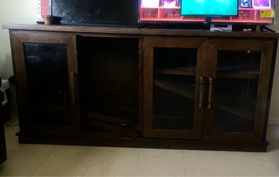 Dark wood TV stand