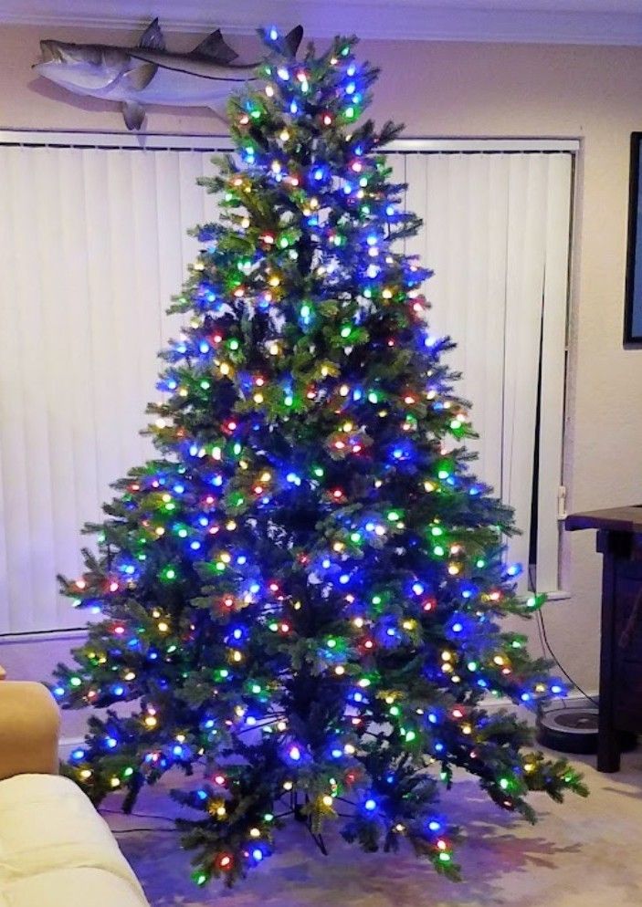 7.5 ft Norway Spruce artificial Christmas tree LED multicolor, multifunction.