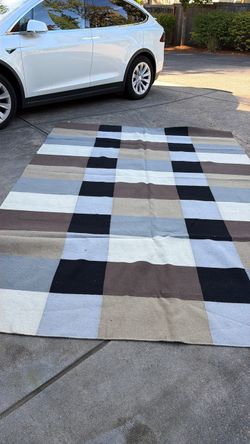 Rug 9’6” x 11’2”
