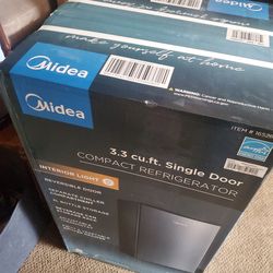 New  midea Fridge # 16528 very nice