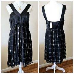 Size Medium Express Black Silk Women's Sleeveless V Neck Tank Summer Evening Cocktail Party Dress with White Streaks Patterned Skirt.  Upper bodice 95