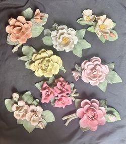 Genuine vintage Capodimonte porcelain floral sculptures handcrafted in Italy.
