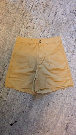 Tan high-waisted shorts with relaxed fit. Size S