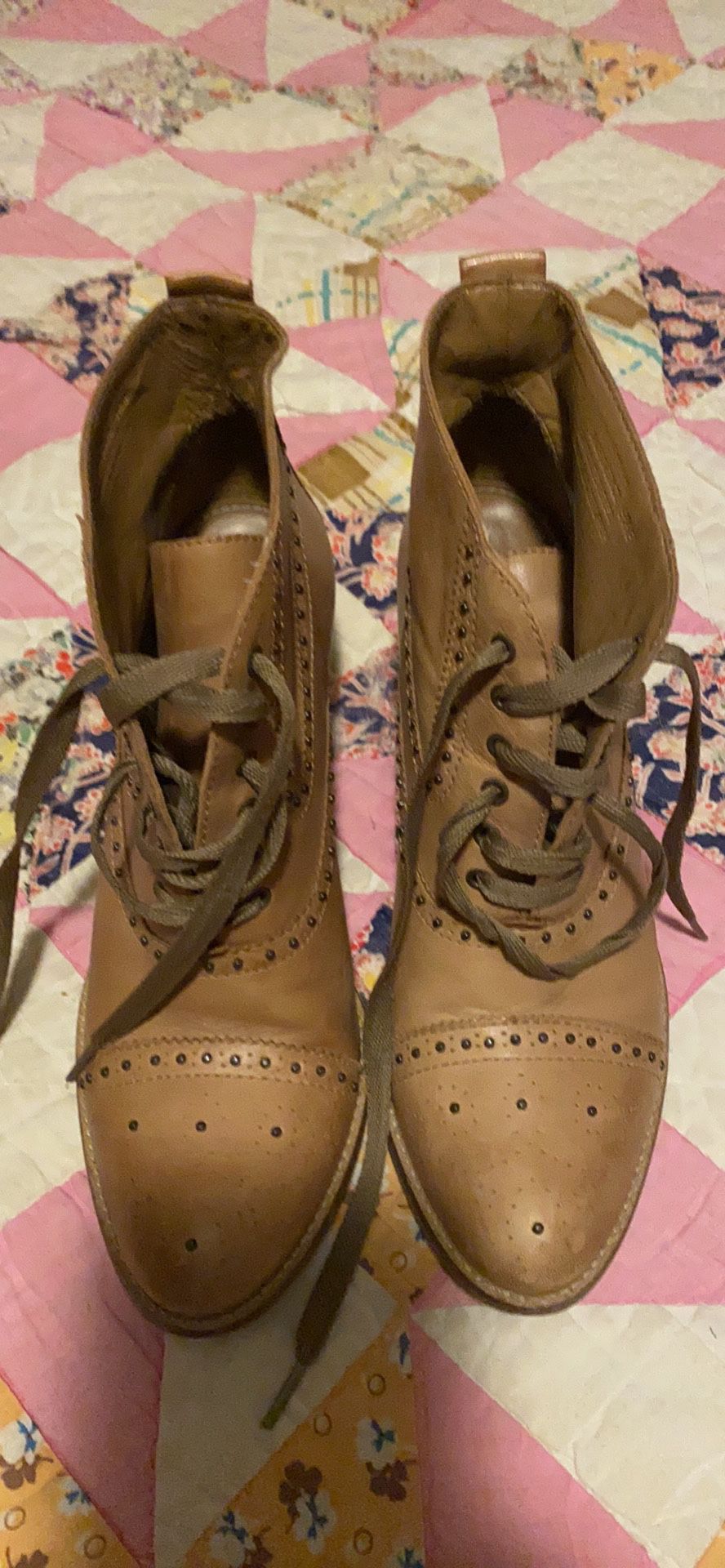 Escher and John’s boot heels brown size 9