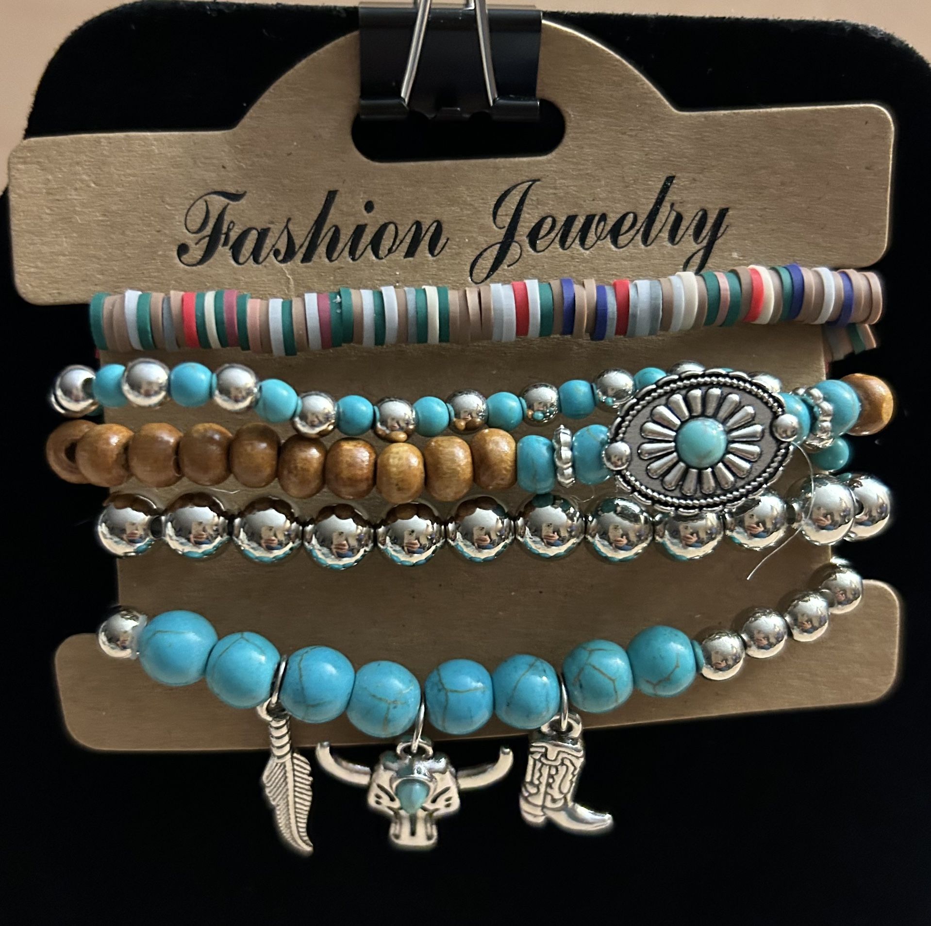 Five piece wooden beaded bracelet set. Brand new.