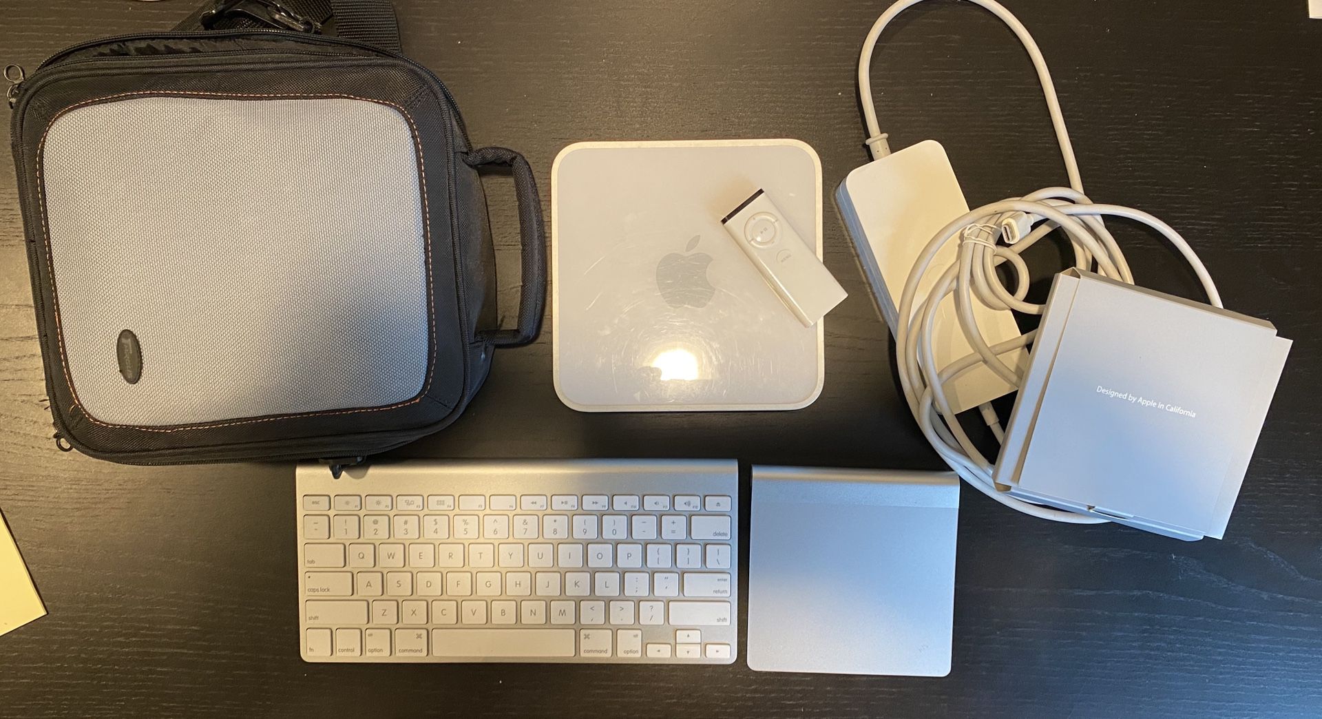 Apple Mac Mini with wireless keyboard, pad and case