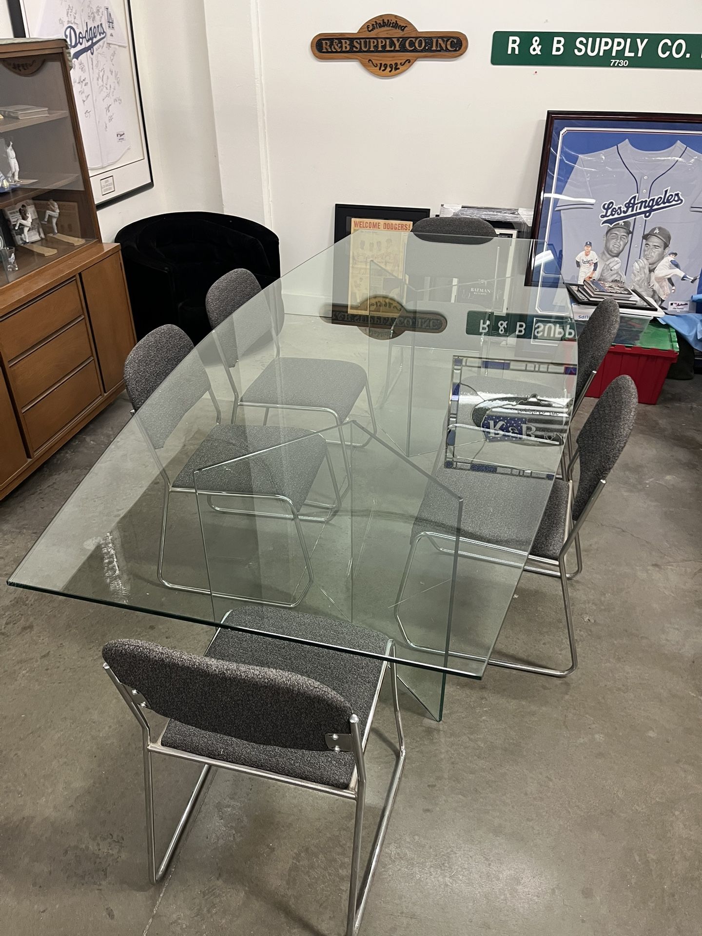 Glass Conference Table ( 9’ Long X 4’ Wide X 31” High)
