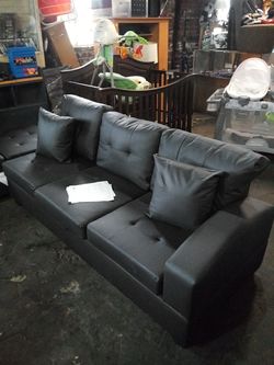 black leather sofa brand new