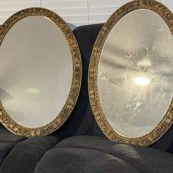 ornate gold oval mirrors measuring 30” x 21” 