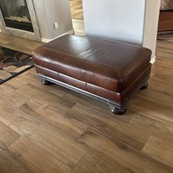 Brown leather ottoman