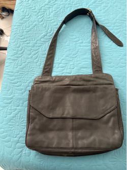 Leather briefcase   Computer size and good compartments