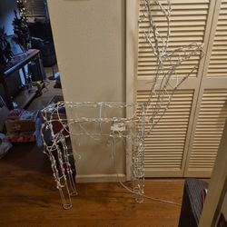 Lighted Outside Deer. His Anthers Gilo From Side To Side