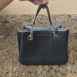 Baby blue Michael Korse Purse