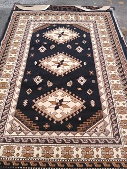 Black ,Brown, and Cream Area Rug