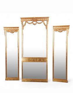 A set of three Louis XVI style giltwood pier mirrors
