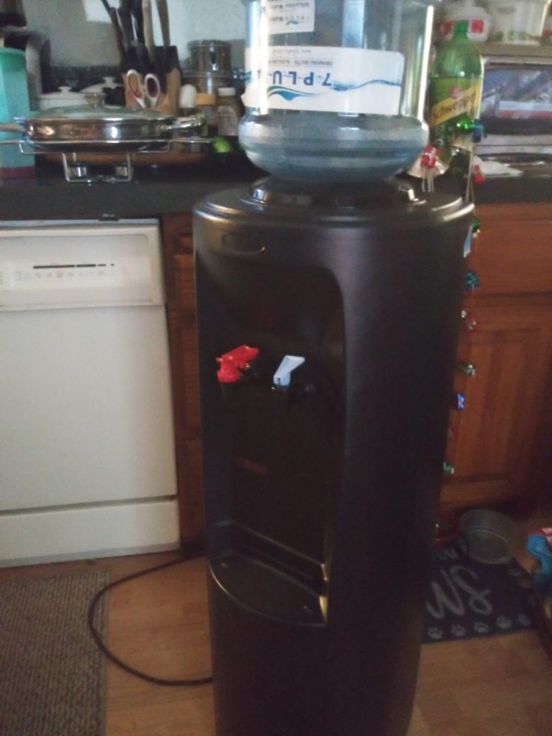 Oasis water cooler cold and hot. Works well. Possibly free delivery.