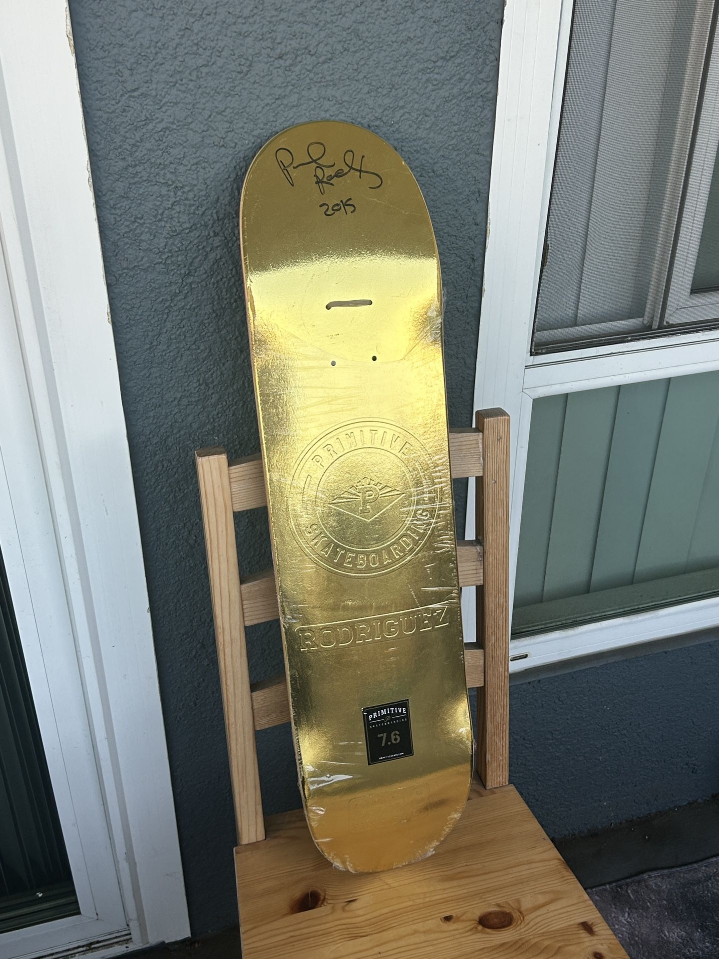 Signed Paul Rodriguez gold Primitive Skateboard