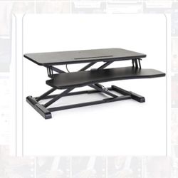Brand New In The Box Sit/Stand Up Desk Convert.  Work While Standing Is Beneficial To Your Health. 