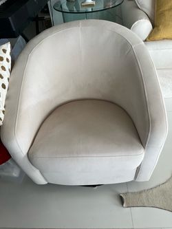 Beautiful swivel off white accent chair