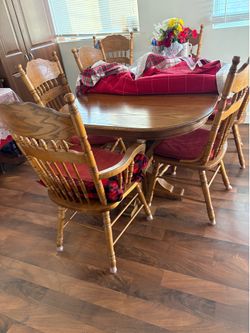 5 ft table  or 8 ft with add leafs  8 chairs